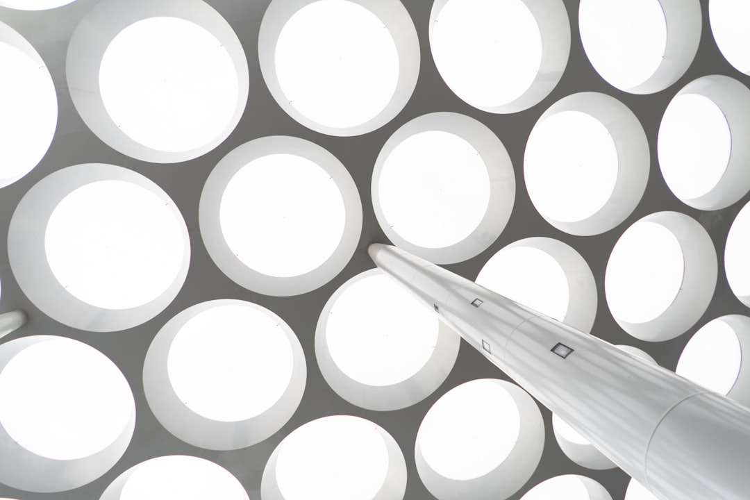 white round plastic on white surface
