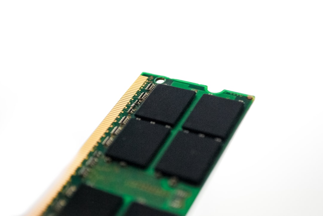 green and black circuit board memory chip