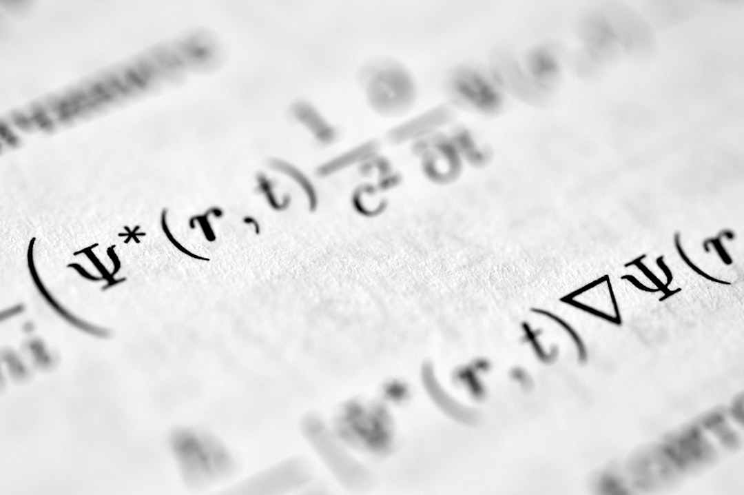 数式が書かれた紙のクローズアップ
