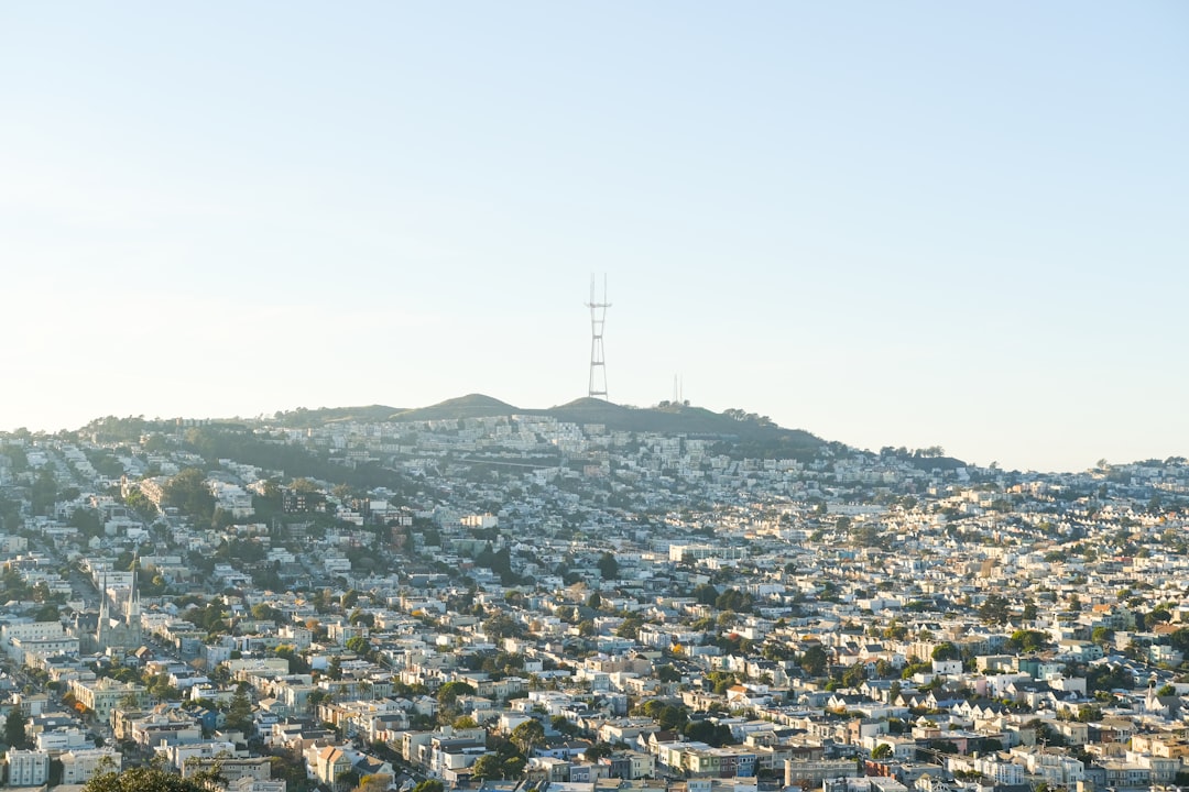 a view of a city from the top of a hill